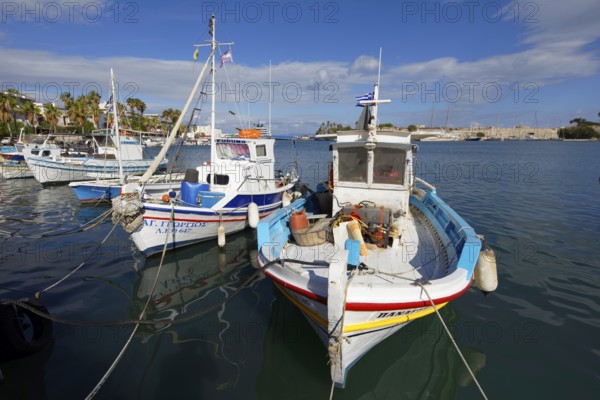 Fishing boat, fishing boats, picturesque, Neratzia fortress in the back, Mandraki harbor, seaport, old town, Kos town, Kos island, Dodecanese islands, Greece, eastern Adriatic Sea, Mediterranean