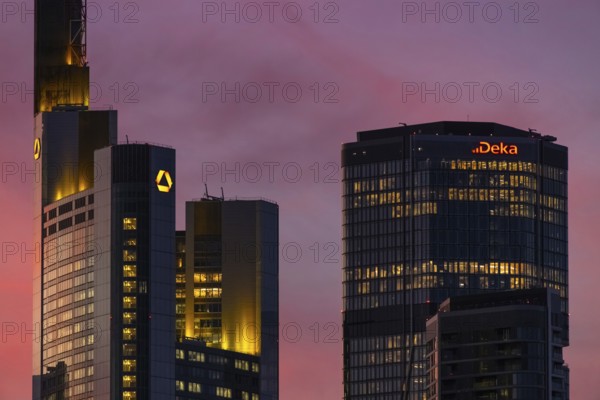 The lights of Frankfurt's banking skyline glow in the evening, Frankfurt, Hesse, Germany