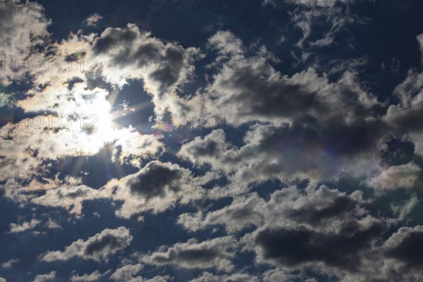 Dramatic cloudy sky with sunbeams, Upper Austria, Austria