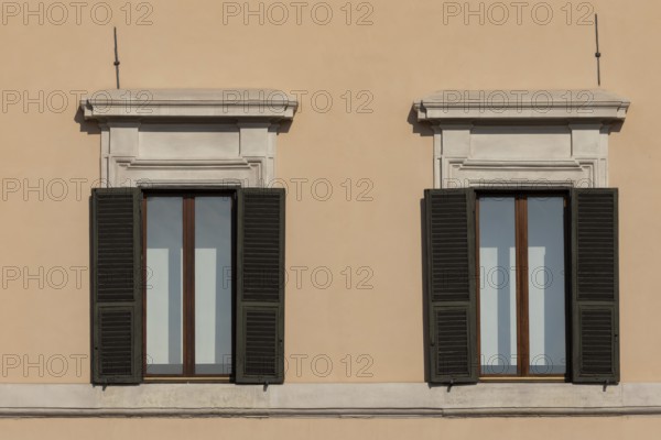 Windows of a building in the city of Rome, Italy