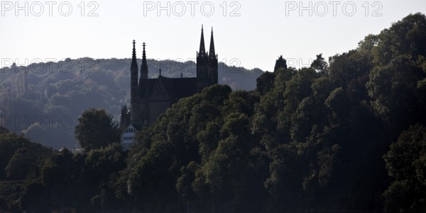 Pilgrimage Church of St. Apollinaris, also Apollinaris Church on Apollinarisberg in Remagen looking back as a silhouette, Rhineland-Palatinate, Germany