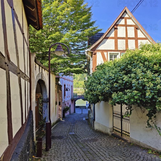 Enge gasse with half-timbered houses in the old town of Unkel, Rotweinstadt, Neuwied district, Rhineland-Palatinate, Lower Middle Rhine, Rhineland, Germany