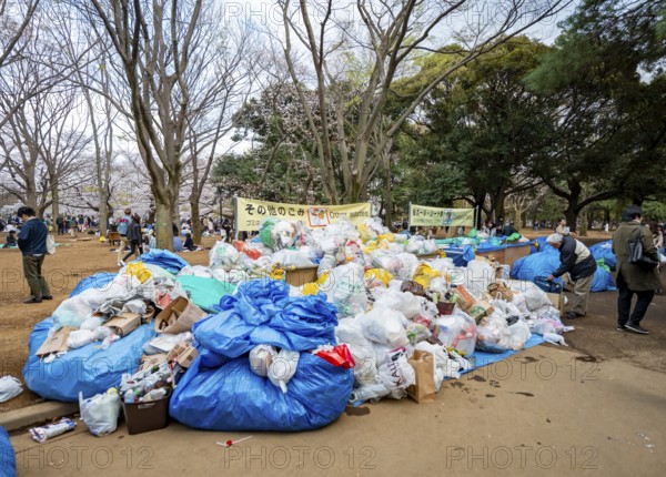 Large piles of trash at a garbage collection point, garbage bags, Yoyogi Park, Hanami Festival, Shibuya District, Tokyo, Japan