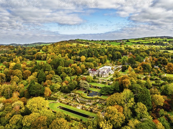 Autumn colours over Bodnant House and Garden from a drone, Conwy River, Colwyn Bay, Conwy, Wales, England, United Kingdom