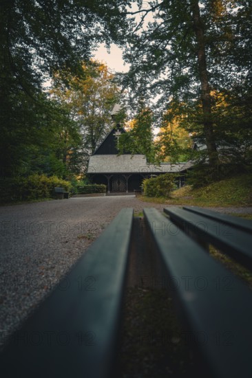 Small wooden church in a forest, atmospheric evening with dark surroundings, Altensteig, Calw district, Germany