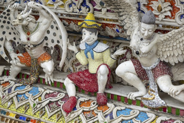 Decorative elements with pop culture references (for example comics, superheroes) in the stucco and porcelain vases outside and inside the art hall with modern art trends such as minimalism and abstraction, Wat Pariwat, Yan Nawa district, Bangkok, Thailand