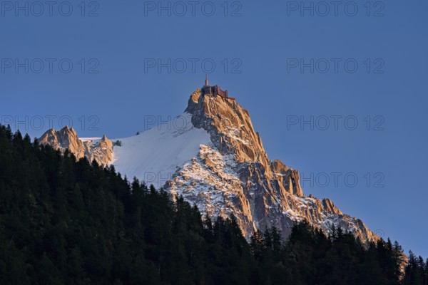 Snowy Aiguille du Midi in the evening light, Mont-Blanc, Chamonix-Mont-Blanc, Haute-Savoie, France