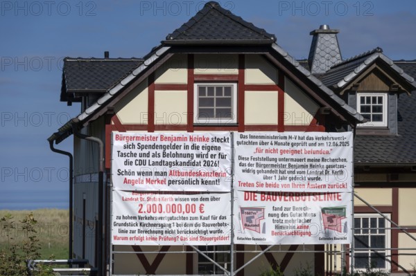 Accusatory posters about donation scandals at a house on the Darß, Meckelnburg-Western Pomerania, Germanymd
