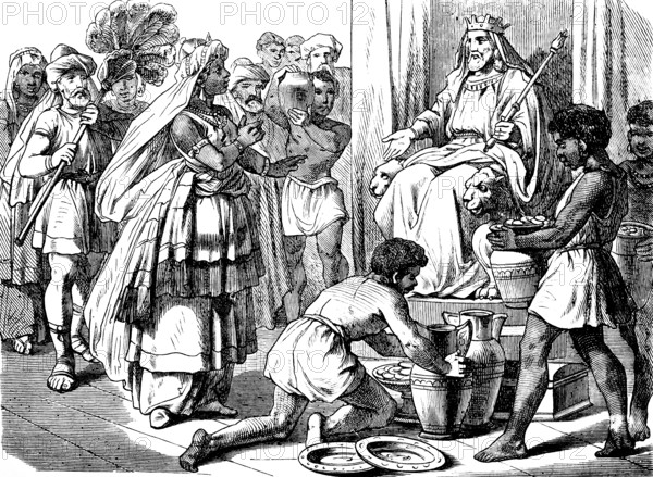 The queen from rich Arabia comes to King Solomon in Jerusalem, First Book of Kings, chapter 10, visit, riddle, temptation, precious stones, gifts, 120 quintals of gold, ebony, servants, pitchers, plates, wealth, group, throne, entourage, royal court, Old Testament, Bible, historical illustration 1877