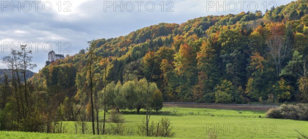 Mixed autumn forest, Egloffstein Castle on the left, Egloffstein, Franconian Switzerland, Upper Franconia, Bavaria, Germany