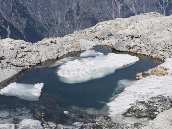 Glacier lake and remnants of the Übergossene Alm glacier on the Hochkönig, symbol of glacier retreat, Berchtesgaden Alps, Austria