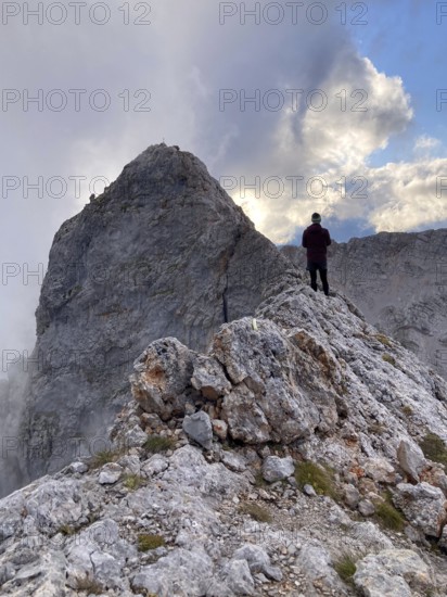 Mountaineers on the ridge of Wildalmkirchl, Steinernes Meer, Berchtesgaden Alps, Austria