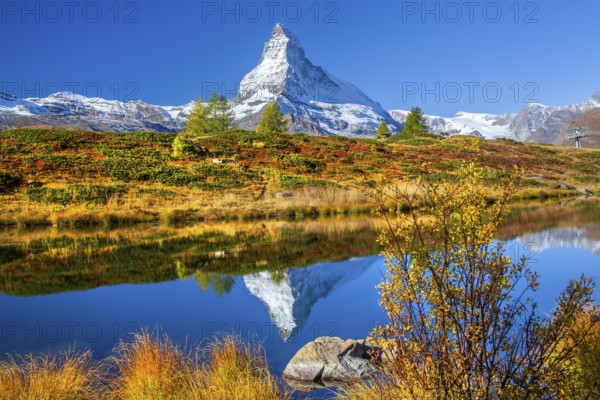 Matterhorn 4478 m with reflection in Leisee on the Sunnegga in autumn, Zermatt, Mattertal, Valais, Switzerland
