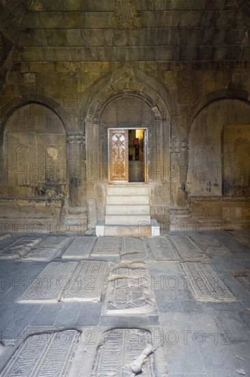 Stone burial chamber with carved tombstones and door to the interior, Noravank Monastery, Surb Karapet Baptist Church, Noravank, Vayots Dzor Province, Wajoz Dzor, Armenia, Caucasus