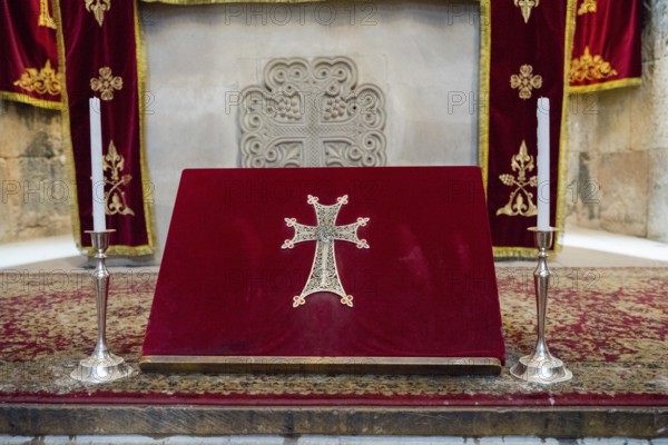 Red altar with golden cross and candle holders, religious site, Noravank monastery, Surb Karapet baptism church, Noravank, Vayots Dzor province, Vayots Dzor, Armenia, Caucasus