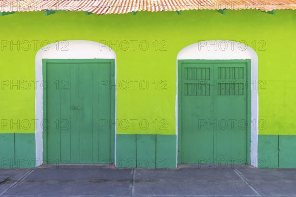 Colorful colonial architecture of historic center of Flores, Guatemala