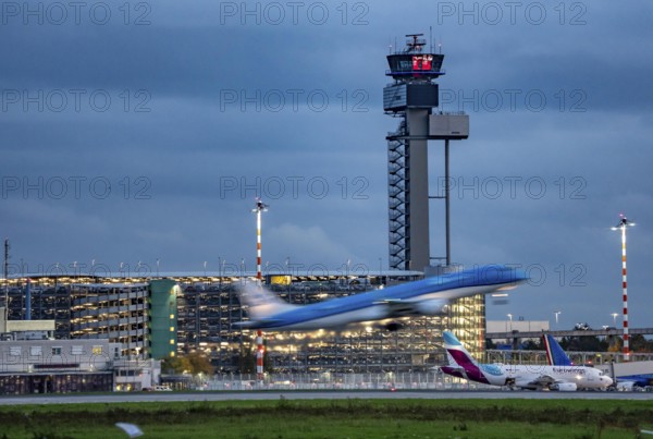 Airplane taking off from Düsseldorf Airport, Air Traffic Control Tower, North Rhine-Westphalia, Germany