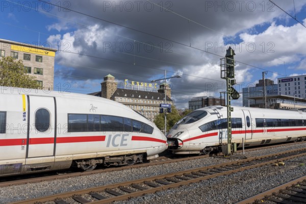 ICE train on track 2 in Essen main station, view of the city center, Handelshof building with Essen lettering, North Rhine-Westphalia, Germany