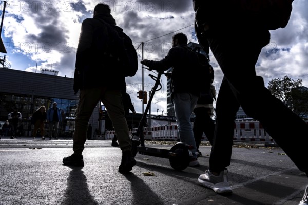Passers-by in downtown Essen at the main train station, North Rhine-Westphalia, Germany