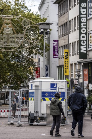 Police video surveillance at the Porsche pulpit, in front of the market church in downtown Essen, mobile monitoring system, crime focus, drug scene, images are transmitted in real time to the police control center, time-limited attempt to make the city safer and deter criminals, North Rhine-Westphalia, Germany