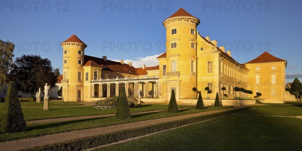 Rheinsberg Castle, front in late evening light, prime example of Friederician Rococo, Ruppiner Land, Brandenburg, Germany