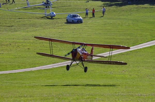 A Stampe-Vertongen SV-4A double-decker registered with HB-UPR during a flight demonstration as part of an air show on Rossfeld in Metzingen-Glems, Baden-Württemberg, Germany, for editorial use only
