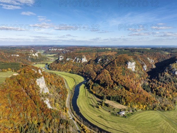 Aerial view of Upper Danube Valley surrounded by autumn vegetation, on the horizon Werenwag Castle, Sigmaringen district, Baden-Württemberg, Germany