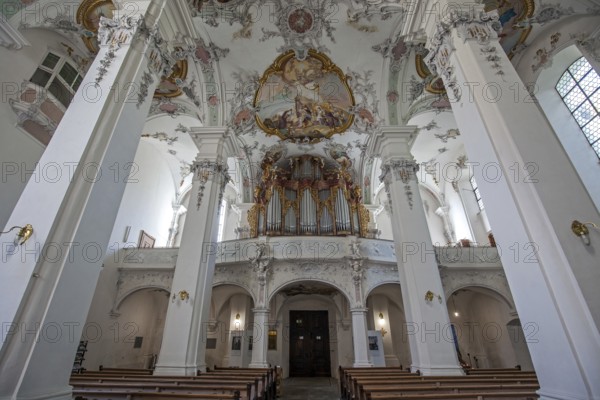 St. George and James Catholic Church, interior view, nave with ceiling frescoes and organ, Isny, Allgäu, Baden-Württemberg, Germany