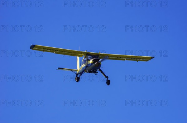 A PZL-104 Wilga-35A sport aircraft from Fliegerklub Kamenz with registration D-EWRZ during a flight demonstration as part of an air show on Rossfeld in Metzingen-Glems, Baden-Württemberg, Germany, for editorial use only