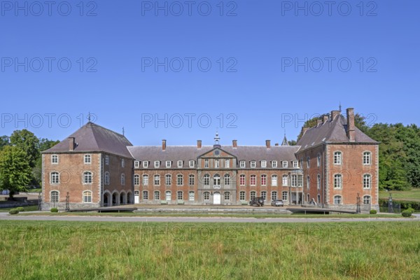 16th century Classicist Château de Franc-Waret in Louis XV style, moated castle in the village Fernelmont, province of Namur, Wallonia, Belgium