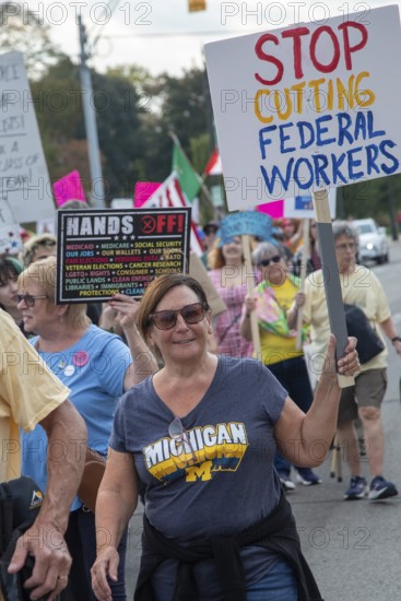 Detroit, Michigan USA - 18 October 2025 - A large crowd gathered for a 'No Kings' rally, protesting President Trump's actions against immigrants and against democratic institutions