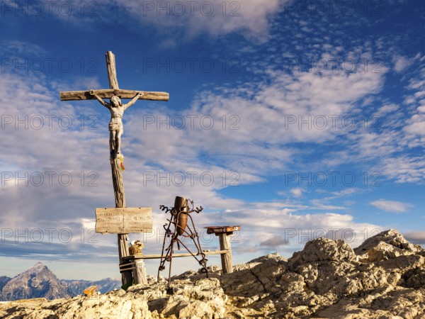 Summit cross and sculpture on the small Lagazuoi, Dolomites, Alps, Belluno province, Veneto region, Italy
