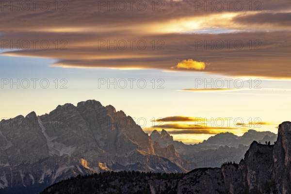 Sunrise over the Dolomites, coloured clouds above, Dolomites, Alps, Belluno province, Veneto region, Italy
