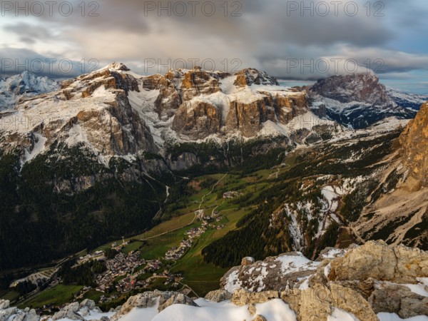 Sella group with fresh snow above the green Val Badia valley, Langkofel on the right, Dolomites, Trentino, South Tyrol, Italy