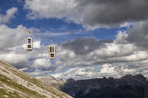 Cabins of the gondola lift to the Sassolungo Valley, Dolomites, Trentino, South Tyrol, Italy