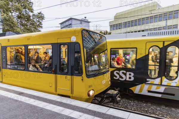Wilhelmsplatz Bad Cannstatt stop, Stuttgarter Strassenbahnen AG, SSB. Platform with passengers. Stuttgart, Baden-Württemberg, Germany