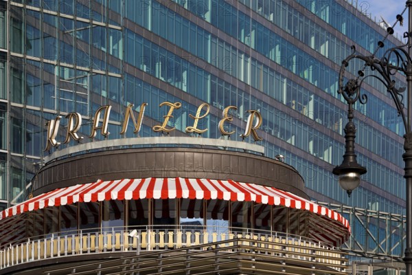 Café Kranzler with historic lantern and modern office building on Kurfürstendamm, Charlottenburg, Berlin, Germany