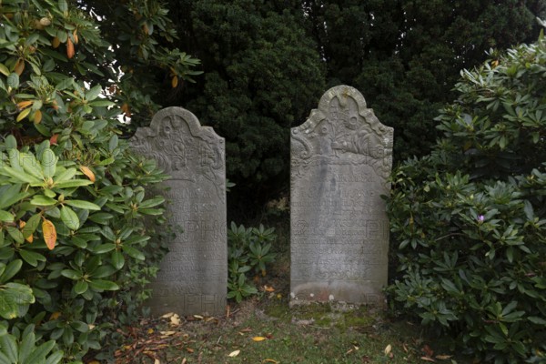 Cemetery of St John's Church with gravestones telling the story of seafarers, known as talking gravestones, Nieblum, Föhr Island, Schleswig-Holstein, Germany