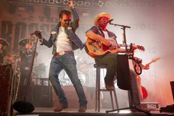 Alec Völkel (Boss Burns) and Sascha Vollmer (Hoss Power), singer of the band The BossHoss on their Back To The Boots Tour 2025 at Capitol Hannover on 3 October 2025