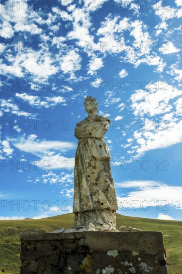 Statue of Virgin Mary. Roc de Courlande in Auvergne Volcanoes Regional Park. Puy de Dome. Auvergne Rhone Alpes. France
