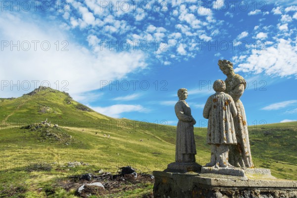 Statue of Virgin Mary. Roc de Courlande in Auvergne Volcanoes Regional Park. Puy de Dome. Auvergne Rhone Alpes. France