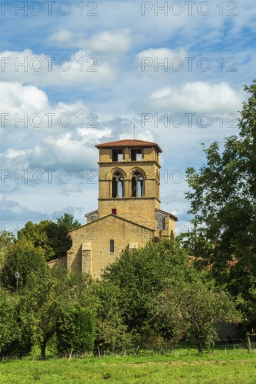 Mailhat village. Romanesque church with its square bell tower, Puy de Dome department, Auvergne-Rhone-Alpes, France