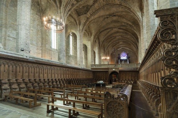Choir stalls and Pope Clement VI tomb Saint Robert Abbey, La Chaise Dieu, Haute Loire, Auvergne Rhone Alpes, France