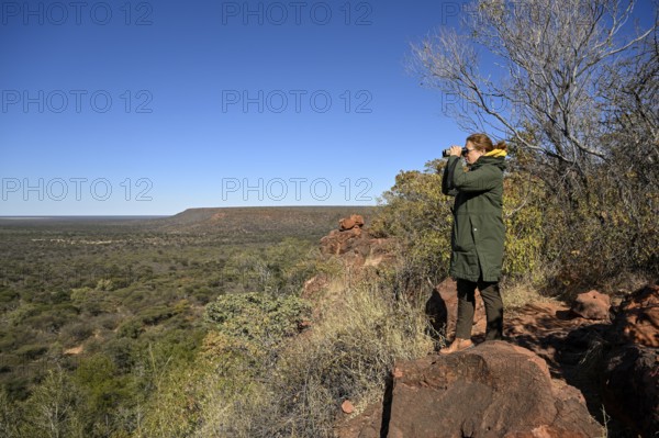 Tourist enjoying the view from Waterberg, Otjozondjupa region, Namibia