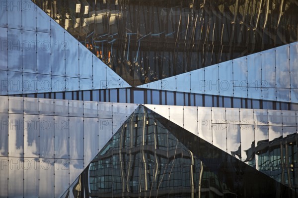 Cube Berlin, cube-shaped office building with folded glass façade reflecting the surroundings, detail, Washingtonplatz, Berlin, Germany