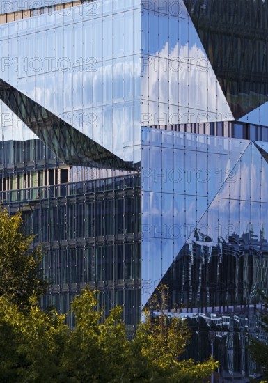 Cube Berlin, cube-shaped office building with folded glass façade reflecting the surroundings, detail, Washingtonplatz, Berlin, Germany