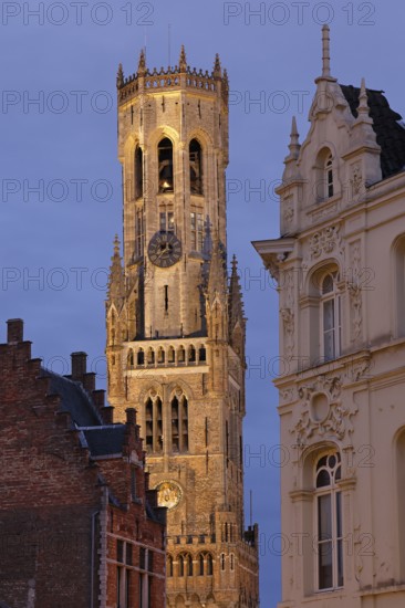 Illuminated Belfry in the historic city centre of Bruges in the evening light, Belfort on the Grote Markt, market square, UNESCO World Heritage Site, Bruges, Flanders, Belgium