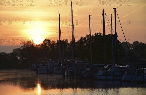 Morning atmosphere, sunrise at Lexfähre harbour, Dithmarschen, Schleswig-Holstein, Germany