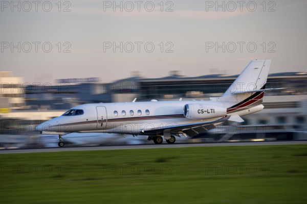 Private jet of the type Cessna Citation Latitude, of the private airline NetJets, landing at Düsseldorf Airport, North Rhine-Westphalia, Germany