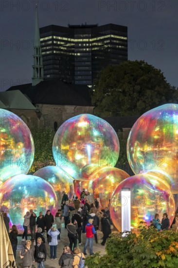 The 10th Essen Light Festival, in the city centre, second largest light art festival in Germany, light art on the Burgplatz, Evanescent light installation, by the Australian artist duo Atelier Sisu, large bubble-like spheres, with light and sound, town hall, cathedral, Essen, North Rhine-Westphalia, Germany